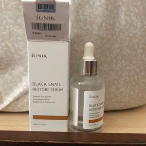 Iunik black snail restore serum